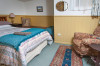 harty arm queen bed with a sofa